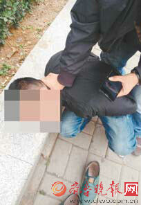 警方抓获敲诈嫌疑人李某。警方供图