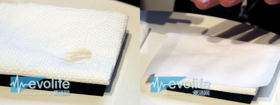 油汙轉移到吸油紙上，織物變得幹幹淨淨