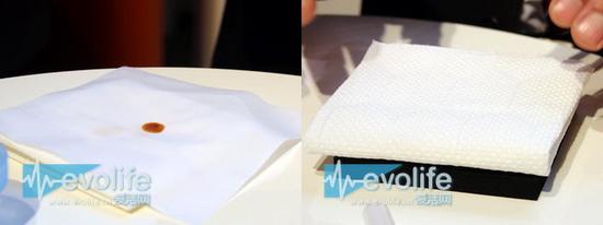 織物沾上了油汙，先在它底下墊上一層吸油紙，並塗上洗滌劑