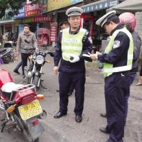海口专项整治摩托车交通违法行为 违法入市拒