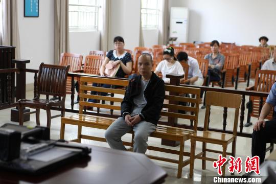 图为庭审现场 韦林汕 摄