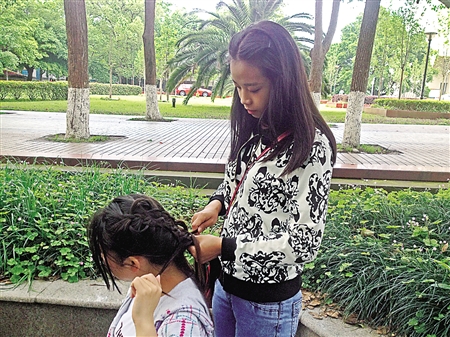 张玉婉的花式编发作品。