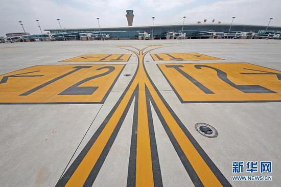 烟台（山东），2015年5月10日 山东烟台蓬莱国际机场将于5月28日启用。5月10日拍摄的烟台蓬莱国际机场航站楼和停机坪。