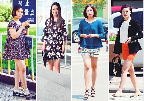 5月24日，热浪已经驾临济南，在泉城广场附近，女孩们短衣出行。 女报记者 梁大磊 摄