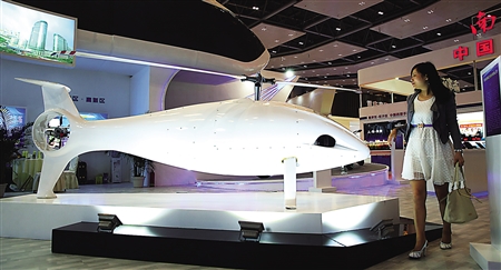 渝洽会现场聚集高精尖 市民体验9D电影大呼过