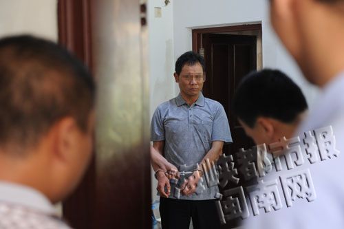 周某根指认现场