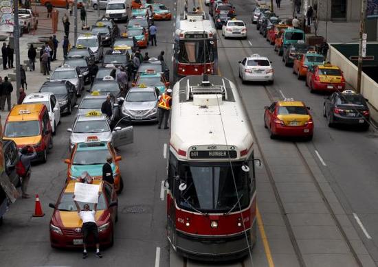 Uber全球遇阻：遭加拿大出租车司机集体抗议