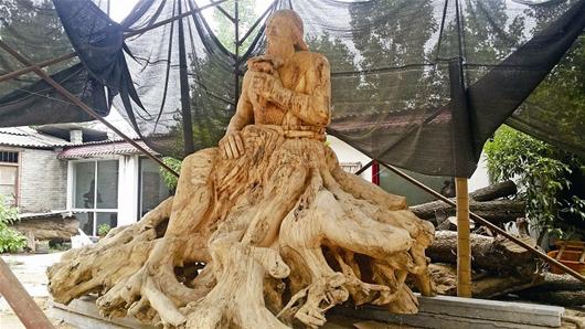 根雕达人用千年树根雕刻巨型炎帝神农像重达5吨_手机新浪网