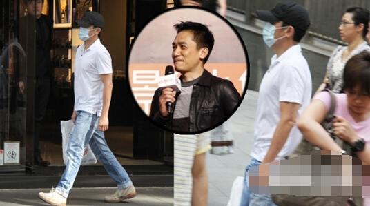 梁朝伟独自现身中环，一身简朴装束。