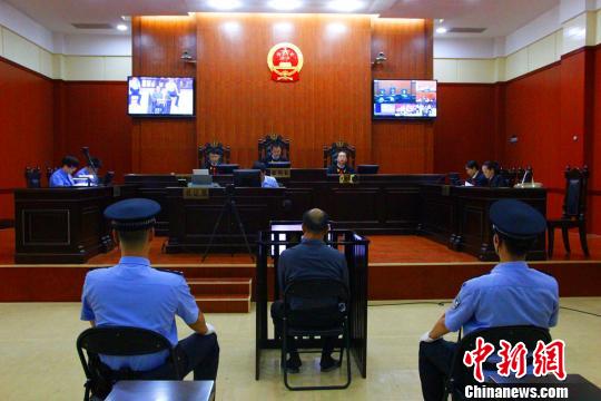 图为庭审现场。朱柳融 摄