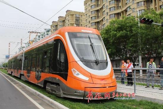 城阳有轨电车将带电试运行 俩公交站点今起调整_新浪青岛_新浪网