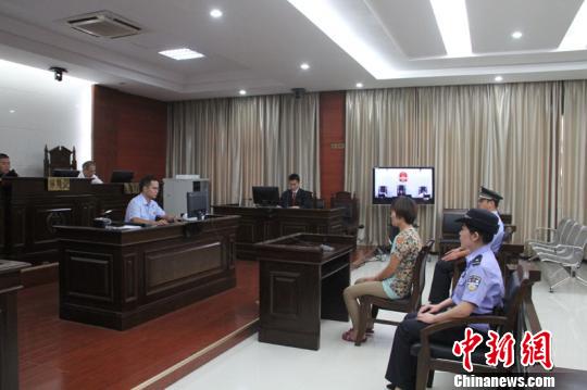 图为庭审现场。 黄芍 摄