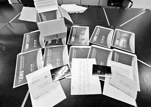 80份包裹内竟全是不雅照 南京快递员受惊报警