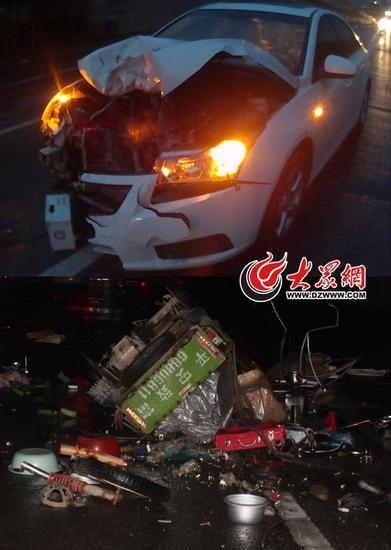 白色轿车车头严重损坏,三轮车在撞击中报废