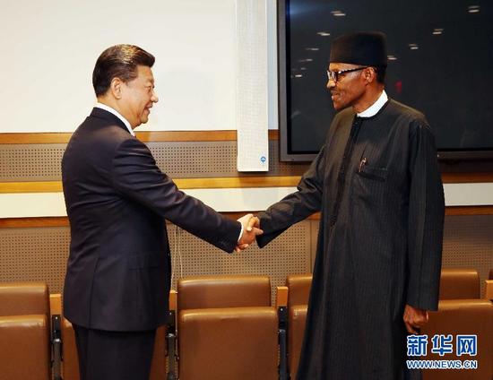 9月27日，国家主席习近平在纽约会见尼日利亚总统布哈里。新华社记者 刘卫兵 摄