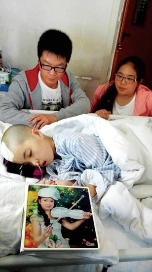 汝州少女患腦瘤生命垂危 大學生送2.5萬愛心款