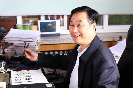 丁再献
