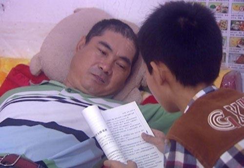 徐州11岁的男孩柳希锐和父亲