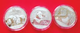 2013版、2014版和2015版熊猫银币