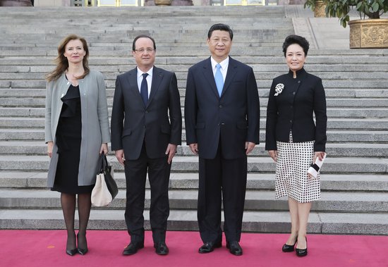 2013年，瓦莱丽陪同奥朗德访问中国。