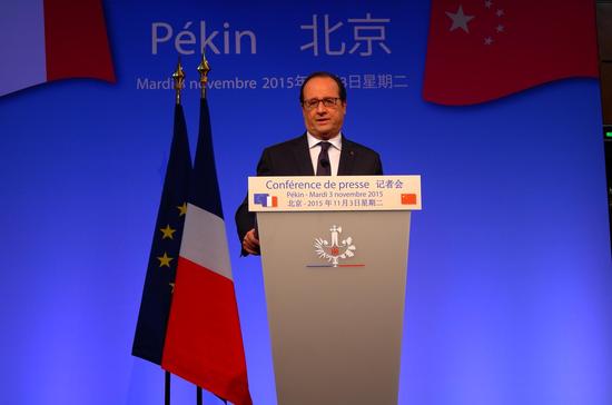 奥朗德召开记者会  新浪国际韩旭阳摄
