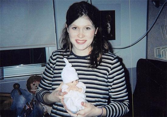 Mother Brianne Jourdin proudly holds Kenadie at hospital before taking her home at three weeks old.