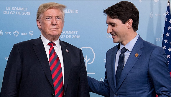 6月8日加拿大魁北克G7峰会，特朗普与特鲁多举行双边会谈。图片来源：视觉中国