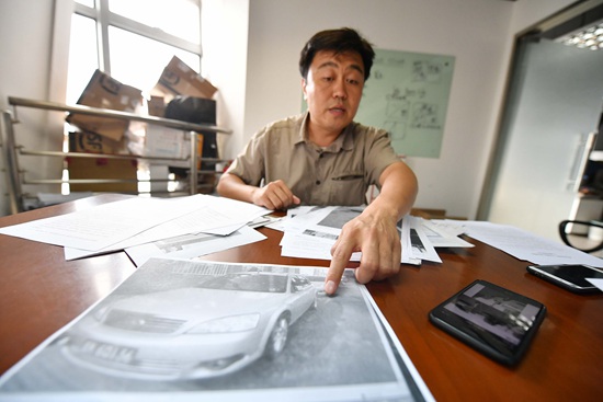 较真男子因违停罚单耗费两年时间打了三个官司