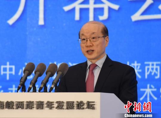 中共中央台办、国务院台办主任刘结一 王刚 摄