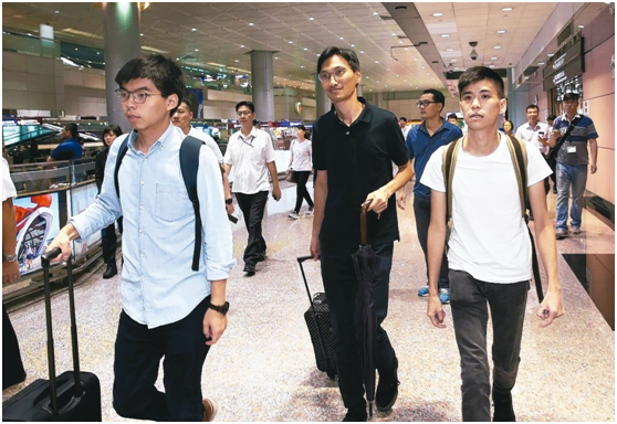 黄之锋等人3日抵达台湾。(图片来源:台湾《联合报》)