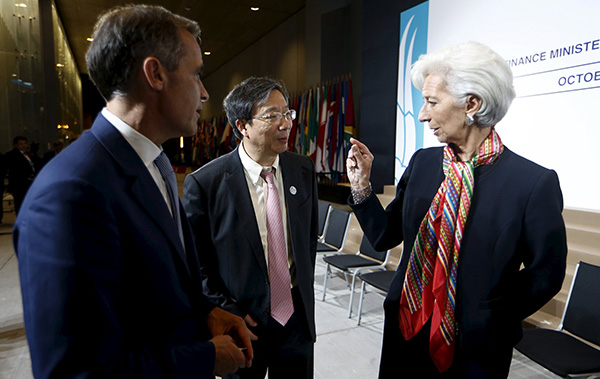 當地時間2015年10月8日,秘魯利馬,國際貨幣基金組織(IMF)及世界銀行年會和20國集團財長與央行行長會議在秘魯首都利馬召開。易剛(中)。視覺中國 資料