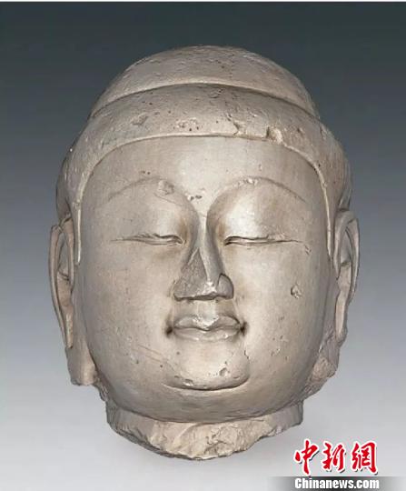 山西忻州忻府佛教造像窖藏坑出土佛像。 考古所提供