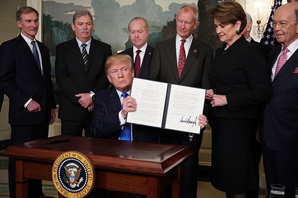 美国挑起对华贸易战 两国商界学者看法折射人