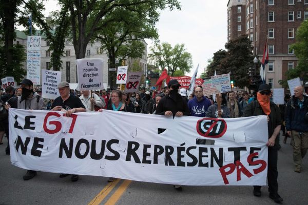 加拿大民众7日在魁北克抗议举行G7峰会（法新社）