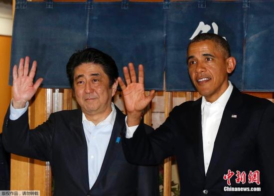 资料图：2014年4月23日晚，日本首相安倍晋三在位于东京银座的高级寿司店，以非官方正式晚宴的方式款待美国总统奥巴马。