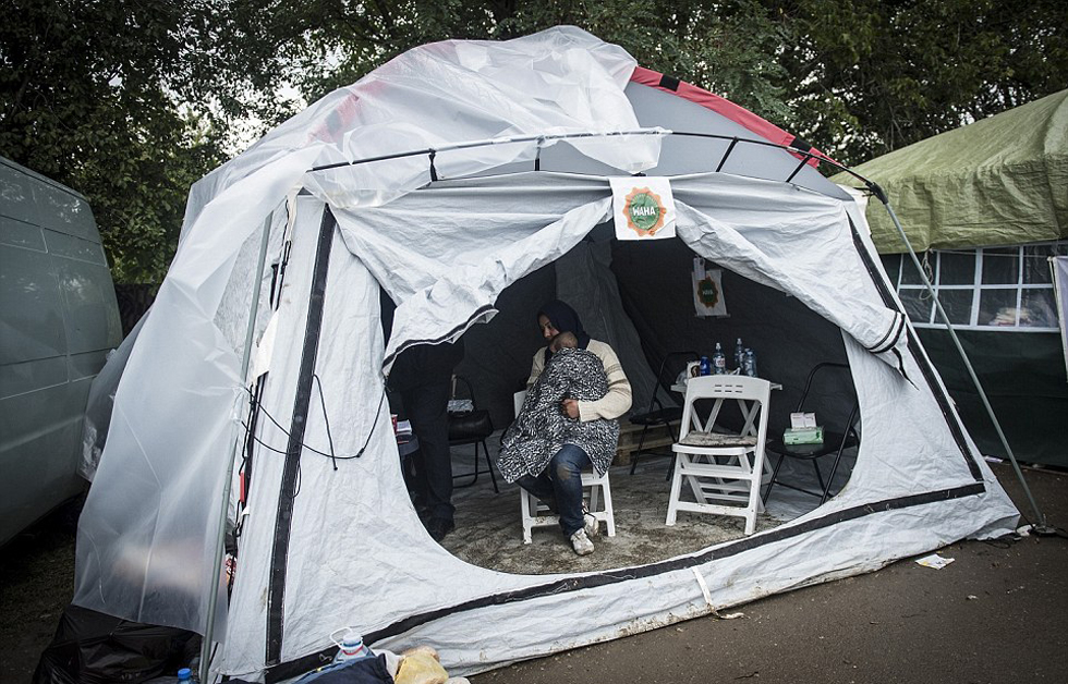 大量老幼残障移民涌入欧洲 面临严寒挑战(高清