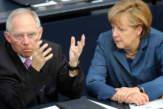 默克尔坚持接收难民没上限 德媒为其选接班