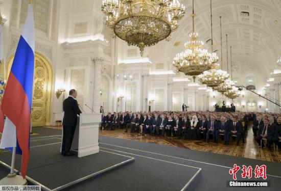 资料图：2015年12月3日，俄罗斯莫斯科，俄罗斯总统普京发表年度国情咨文。