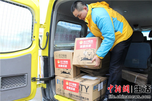 不一样的春运风景:今年摩托大军回家没包袱