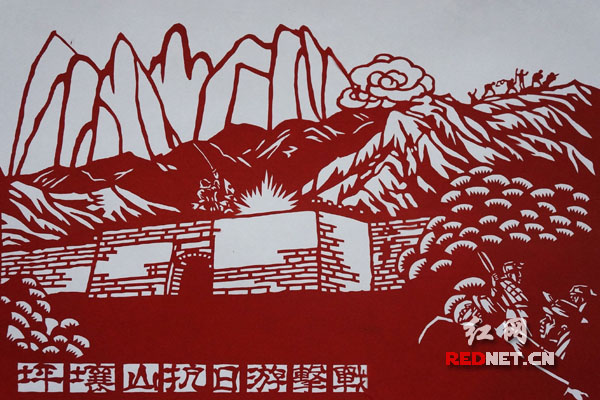 双峰乡镇干部巧手剪出近一米"两学一做"剪纸作品