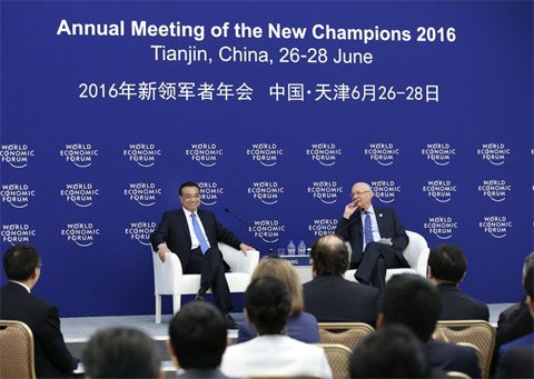 李克强在天津会见2016夏季达沃斯论坛企业家代表。新华社记者 庞兴雷 摄