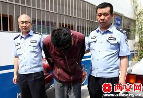 西安女子当街遭飞车拖行数十米 手机被抢