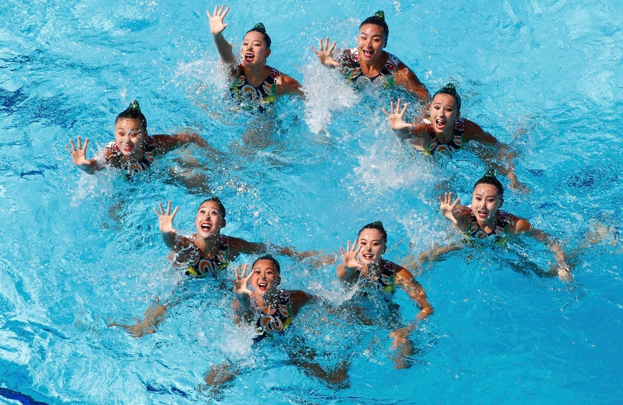 奥运会第14比赛日:羽毛球男双摘金 男子4×10