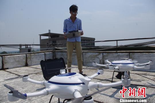 南昌万寿宫庙会人如潮涌 首次启用无人机执行