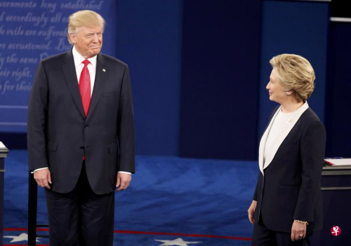 美国大选总统候选人第二场辩论于当地时间9日晚间举行。两党候选人火力全开。(图片来源：路透社)
