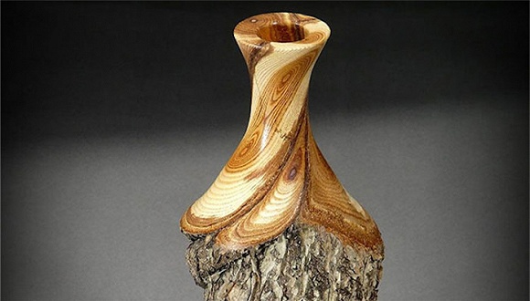 原木雕刻的花瓶真好看,想要来一打