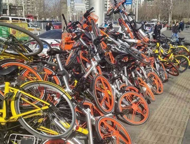 为何要我缴停车费?用户停车场取共享单车被收