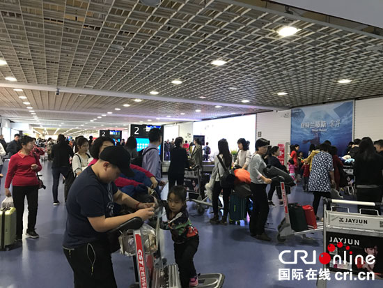 【新春走基层】寒冬加雾霾催旺琼岛春节家庭游