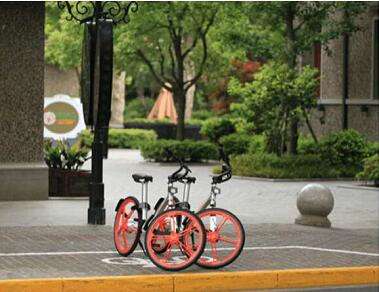 马路两边小区学校…济南共享单车停哪才对 官