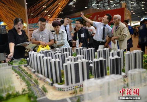 住建部:热点城市房价过快涨势被遏制 房地产税